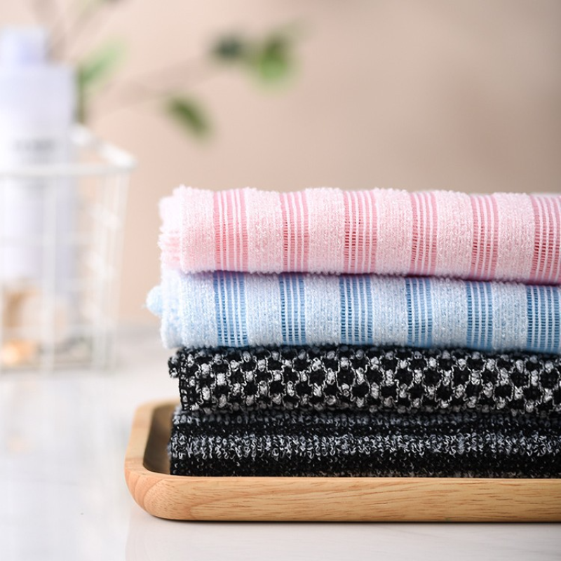 ScrubTowel 1+1 GRATIS - Eksfolierende Brusehåndklæde til Peeling